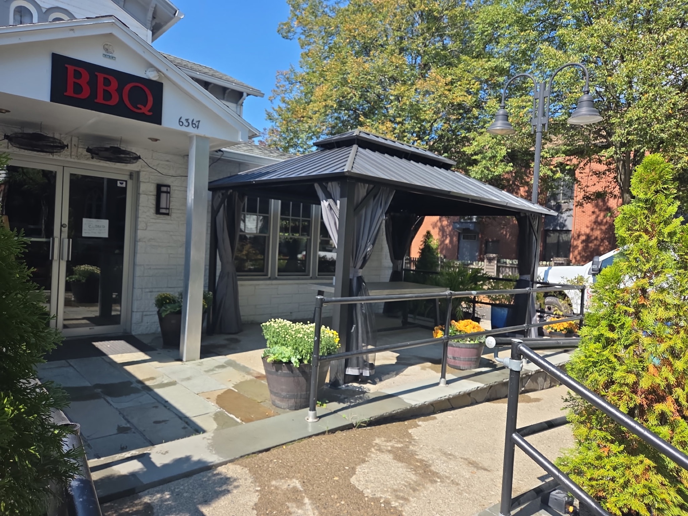 Smoky Rock BBQ front patio entrance with updated canopy and landscaping
