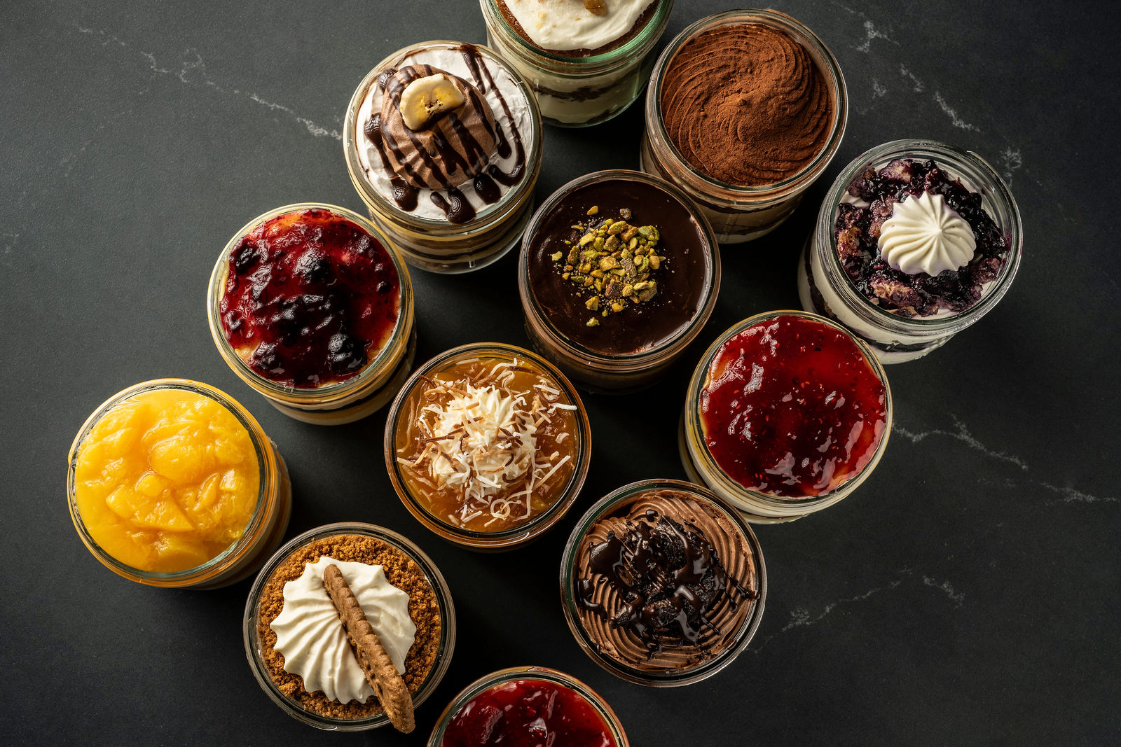 Overhead assortment of dessert jars from Smoky Rock Bakery