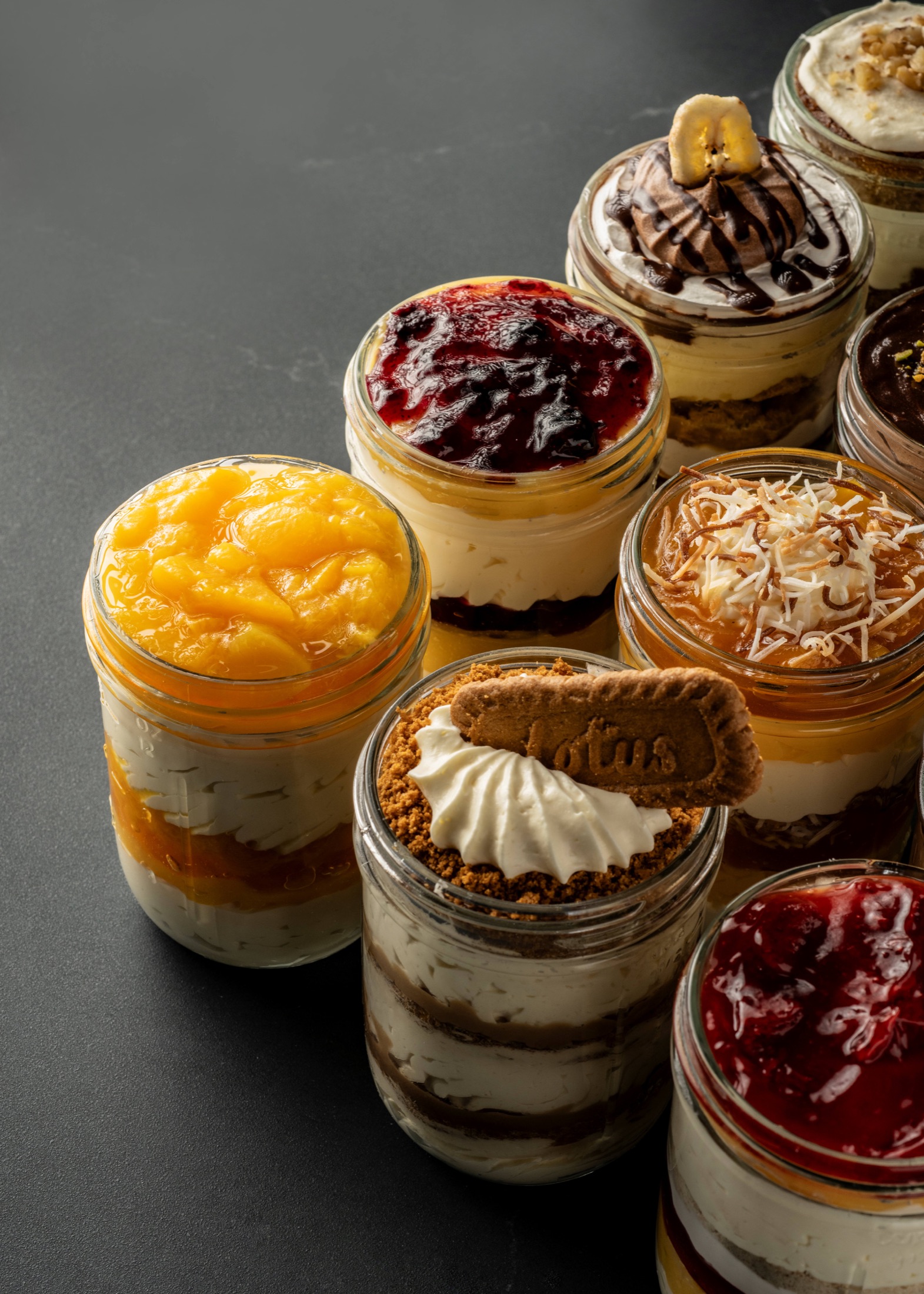 Smoky Rock Bakery dessert jars with fruit, cookie, and cream toppings
