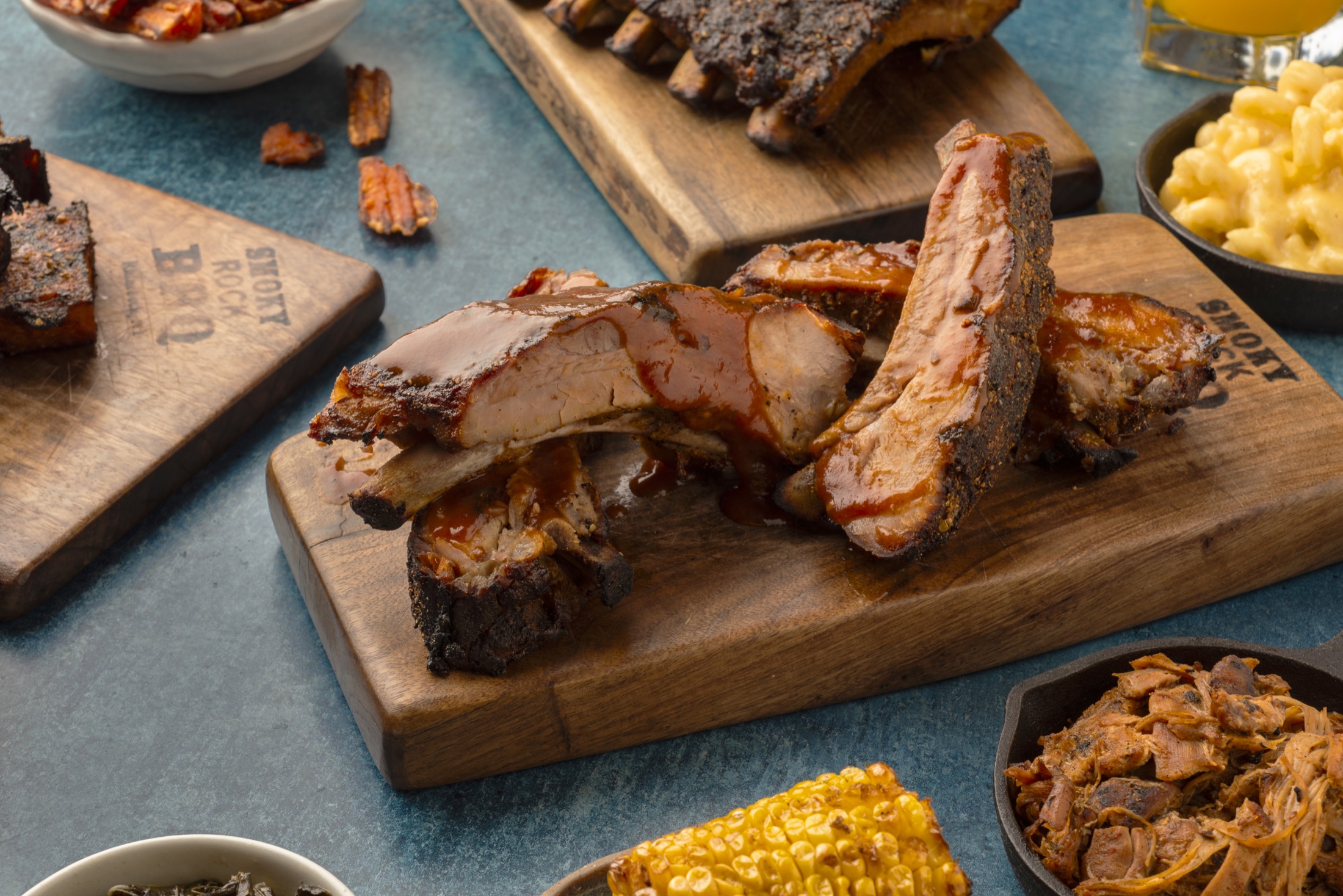 Smoky Rock BBQ ribs with barbecue sides
